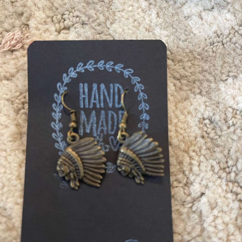 Warrior head earrings